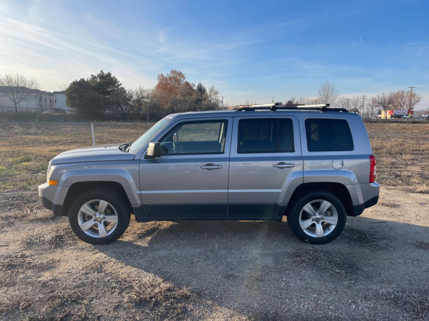 2017 Silver /Black Jeep Patriot Latitude (1C4NJRFBXHD) with an 2.4L L4 DOHC 16V engine, AT transmission, located at 813 E Fairview Ave, Meridian , ID, 83642, (208) 336-8230, 43.618851, -116.384010 - Photo#0